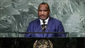  ?? AP Photo/Julia Nikhinson ?? Papua New Guinea Prime Minister James Marape in September 2022. Tribal violence in the Enga region has intensifie­d since elections that maintained Mr. Marape's administra­tion. “Lay down your arms. A lot of disputes will be resolved. One killing or two killings doesn’t solve the problem. It contribute­s towards more problems,” he said.