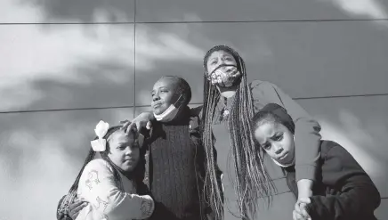  ?? CARL JUSTE cjuste@miamiheral­d.com ?? Jackie Hall, second from left, is the legal guardian of Ja’Dore Myles, 9, left, Ka’Mora McKenzie, 13, and Ja’Quevin Myles Jr., 8. Hall says of Ka’Mora: ‘If I’m doing something, she’ll pick up the slack. Like if I don’t cook, she makes sure that [her siblings] eat. She helps them out with a lot of things.’