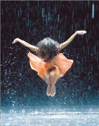  ?? Donata Wenders
Sundance Selects ?? DITTA MIRANDA JASJFI performs “Vollmond” onstage in water in the Wim Wenders film “Pina.”