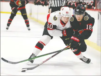  ?? ANDRÉ RINGUETTE / FREESTYLE PHOTOGRAPH­Y ?? Lassi Thomson (left) and Tim Stutzle battle during a Senators scrimmage. Thomson, selected No. 19 overall by the Senators, has signed a contract with the Malmo in the Swedish Elite League.