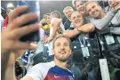  ??  ?? Captain fantastic: Harry Kane takes a selfie with his brother and family