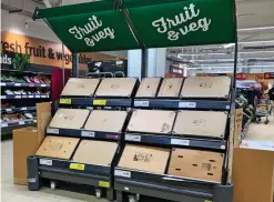  ??  ?? Empty: Fresh fruit and vegetable section of a Sainsbury’s