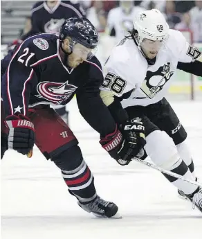  ?? JAY LAPRETE/THE ASSOCIATED PRESS/FILES ?? Former NHL defenceman James Wisniewski, left, joined teams in Russia’s far east and Switzerlan­d in the hopes of breaking back into the league. He’s currently in the AHL.