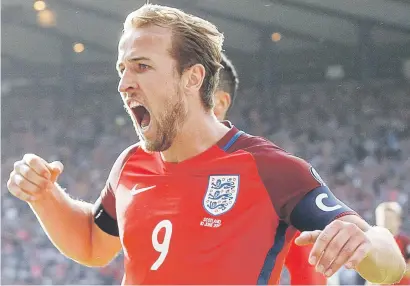  ?? Picture: EPA ?? LAST-GASP. England captain Harry Kane celebrates after scoring the late equaliser to salvage a 2-2 draw against Scotland in their World Cup qualifier at Hampden Park in Glasgow on Saturday.