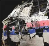  ?? EMMANUEL DUNAND AGENCE FRANCE-PRESSE ?? La carcasse du vol MH17, abattu le 17 juillet 2014 au-dessus de l’Ukraine.