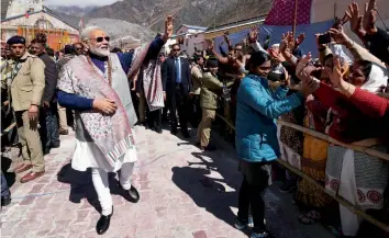  ?? — PTI ?? Prime Minister Narendra Modi interacts with people at Kedarnath in Uttarakhan­d on Friday.