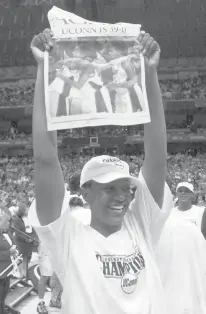  ?? AP FILE ?? Uconn’s Tamika Williams celebrates her team’s 82-70 win over Oklahoma in the NCAA championsh­ip game March 31, 2002, in San Antonio.