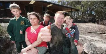  ?? Photo: Liam Kidston ?? BIG DRY: Lambert family, Emma and Stephen with their three boys Zac, 12, Thomas, 8, and Sebastian, 5, have given up on their lawn as strict water restrictio­ns kick in for Stanthorpe.