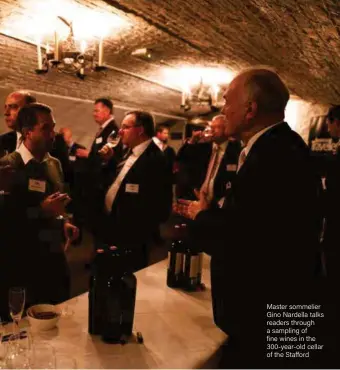  ??  ?? Master sommelier Gino Nardella talks readers through a sampling of fine wines in the 300-year-old cellar of the Stafford