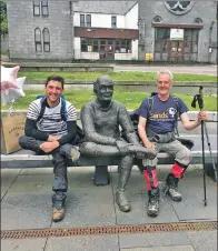  ??  ?? Luke, left, and John Brooks resting at the end of the arduous West Highland Way.