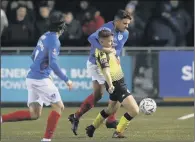  ?? PICTURE: MARTIN RICKETT/PA ?? CREATIVE THREAT: Harrogate Town’s Joshua Falkingham is hauled back by Portsmouth’s Gareth Evans.