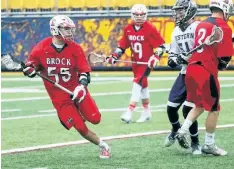  ?? FILE PHOTO ?? Alex Pace, No. 55, on the attack for a Brock University men's field lacrosse team that went undefeated before falling short in the Canadian championsh­ip final.