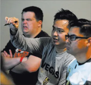  ?? Rachel Aston ?? Las Vegas Review-journal @rookie__rae Local hockey fan Kale Ng asks a question during Session 2 of Vegas Golden Knights University, a five-session tutorial presented this season by team officials at T-mobile Arena.