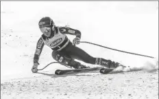  ?? ASSOCIATED PRESS ?? IN THIS NOV. 15, 2017, file photo, Mikaela Shiffrin gets low in her turn during a downhill training run at Copper Mountain, Colo.