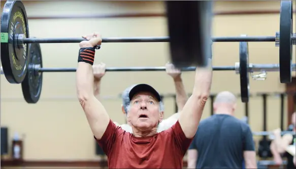  ?? MARK BRETT/Local Journalism Initiative ?? Kris Newman of Invermere is pictured competing in the masters portion of the Okanagan Valley Throwdown, Saturday at the Penticton Trade and Convention Centre.