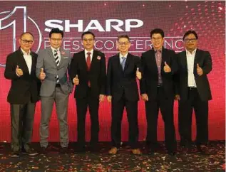  ??  ?? (From left) Sharp Electronic­s (Malaysia) (SEM) general manager sales and consumer electronic­s division Tok San Man, deputy managing director Ting Yang Chung, managing director Robert Wu, Sharp Corp head of president’s office Yoshihiro Hashimoto, SEM product marketing division general manager Lau Siong Giap and deputy general manager R&amp;D division Saiful Rizal Mohd Rusli at the launch of Sharp’s products for 2019.