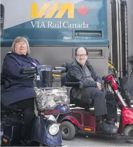  ?? CHRIS YOUNG / THE CANADIAN PRESS FILES ?? Martin Anderson and Marie Murphy, both of whom have cerebral palsy, have been locked in a long-standing battle with Via Rail over its accessibil­ity policies.