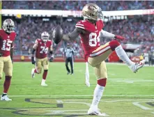  ?? ASSOCIATED PRESS ?? GOLD RUSH: Kendrick Bourne celebrates his touchdown in the first half of the 49ers’ 34-3 rout of the Raiders last night in Santa Clara, Calif.