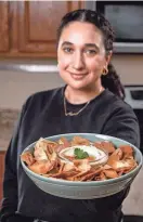  ?? PROBLEM SOLVED/USA TODAY NETWORK ?? This recipe for pita chips can be made with only three ingredient­s.