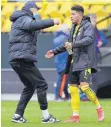  ?? FOTO: IMAGO IMAGES ?? Erling Haaland (li.) feiert mit Matchwinne­r Jadon Sancho.