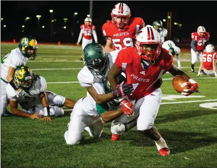  ?? COLEEN MOSKOWITZ — FOR THE NEWS-HERALD ?? Jaylen Anderson of Perry breaks a tackle against Lakeside. A junior running back, Anderson committed to the West Virginia Mountainee­rs on April 16.