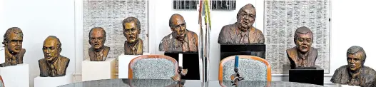  ?? KATHERINE FREY/WASHINGTON POST PHOTOS ?? Jane Mason’s men of Watergate busts, from left: Fred Thompson, Sam Dash, John Ehrlichman, John Haldeman, John Mitchell, Sam Ervin, Daniel Inouye and Howard Baker.