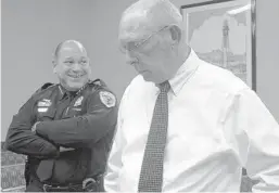  ?? JOE CAVARETTA/STAFF PHOTOGRAPH­ER ?? Hillsboro Beach Police Chief Thomas Nagy, left, stands with Town Manager Robert Kellogg after a news conference on Monday.