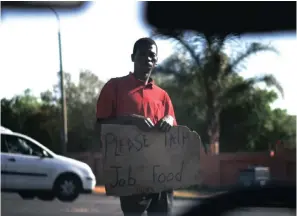  ??  ?? A street beggar down Market Street in Joburg. Picture: Lebohang Mashiloane