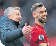  ??  ?? Manchester United coach Ole Gunnar Solskjaer with recent recruit Bruno Fernandes