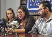  ?? MICHELLE R. SMITH / ASSOCIATED PRESS ?? Lilian Calderon (center), next to her husband, Luis Gordillo, cries at a February news conference at the ACLU’s office in Providence, R.I., as she describes her experience­s while in custody.