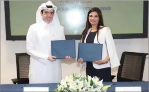  ?? ?? MoU was signed by Director of Profession­al Training at QFBA Majid Al Khulaifi, and Commercial Director, MEA at Fitch Learning, Linda O’Hara.