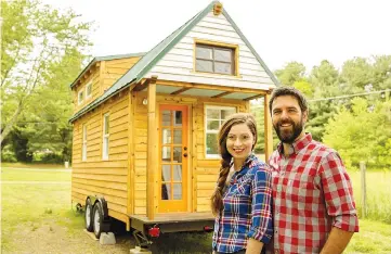  ?? WPBloomber­g photo ?? Stephens and Parsons have taken their tiny home across 27 states while working on a documentar­y about the tiny-home movement.—