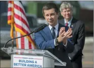  ?? STEPHEN B. MORTON — THE ASSOCIATED PRESS ?? U.S. Transporta­tion Secretary Pete Buttigieg speaks to the media during a visit to the Georgia Ports Authority’s Megarail facility on Friday.