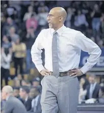  ?? PHELAN M. EBENHACK/AP ?? UCF coach Johnny Dawkins urged his players to snap out of a secondhalf lull during the Knights’ win over Sacred Heart on Sunday.