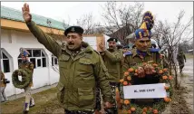  ?? DAR YASIN / ASSOCIATED PRESS ?? An Indian paramilita­ry officer shouts slogans Saturday during a ceremony for fallen colleagues at a base camp on the outskirts of Srinagar, Indian-controlled Kashmir.