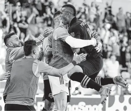  ??  ?? Dynamo forward Mauro Manotas celebrates his equalizer in Saturday’s season-opening draw with the LA Galaxy.