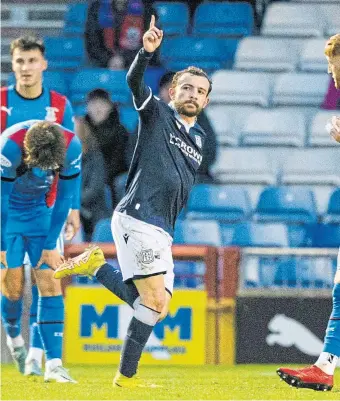  ?? ?? Paul Mcmullan wheels away after putting Dundee in front against Caley Thistle.