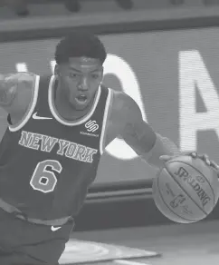  ?? DUANE BURLESON/AP ?? Knicks guard Elfrid Payton says the team loses a home-court edge with no fans at the arena.“It’s not so much the rims and the familiarit­y, but it’s just the fans just being in that arena. The crowd is kind of our home-court advantage,”he said.