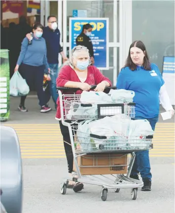  ?? — MIKE BELL ?? Shoppers in B.C. are finding higher prices for items such as beef, chicken and pork when they buy groceries during the pandemic.