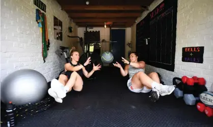  ??  ?? Harlequins’ Amy Cokayne and Bethan Dainton try to maintain fitness with the future uncertain for the funding of the women’s game. Photograph: Mike Hewitt/Getty Images
