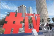  ?? AP-Luis Santana ?? Blue skies and favorable weather greet the thousands of fans attending the festivitie­s at Curtis Hixon Park during the NFL’s Super Bowl 55 Experience on Jan. 30 in Tampa.