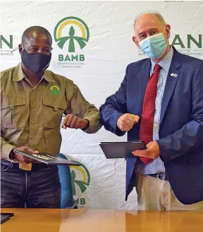  ??  ?? DONE DEAL:
BAMB and BUAN after signing the MOU