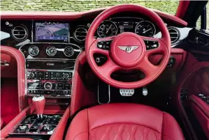  ??  ?? Speed keeps aviation-style dials, while Fireglow red leather covers the whole interior