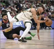  ?? AARON ONTIVEROZ — THE DENVER POST ?? Nuggets guard Jamal Murray, left, attempts to steal the ball from Celtics guard Derrick White during the second quarter at Ball Arena in Denver on Thursday.
