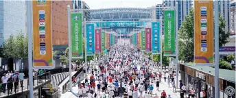  ?? — AFP file photo ?? England supporters arrive at Wembley Stadium ahead of the UEFA Euro 2020 match between England and Croatia in London.