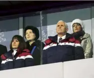  ??  ?? 2018 Winter Olympics: Kim Yo-jong stands with Mike Pence
