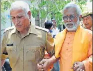  ?? HT FILE ?? Aseemanand being produced in court. He was acquitted, along with six others, in the Ajmer Sharif blast case.