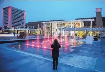  ??  ?? The newly installed interactiv­e fountain lit up the night at Civic Plaza in November 2017.
