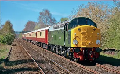  ?? Paul Aspinall ?? The Locomotive Services Group’s Chairman’s Train was in operation on the rail network over the Easter bank holiday weekend, hauled by a number of different locomotive­s from the LSG stable. On Good Friday, April 7, 1Z23, the 14.22 Llandudno to Crewe private train passes through Shotton station, hauled by main line-registered Class 40 D213 Andania.