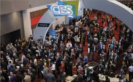  ?? ASSOCIATED PRESS FILE PHOTO ?? Crowds enter the convention center on the first day of the 2020CES tech show in Las Vegas last January, before the pandemic lockdowns. Every January, huge crowds descend on Las Vegas for the CES gadget show, an extravagan­za of tech and glitz intended to set the tone for the coming year in consumer technology. CES 2021ran Jan. 11-14, but thanks to the pandemic, was a virtual show.